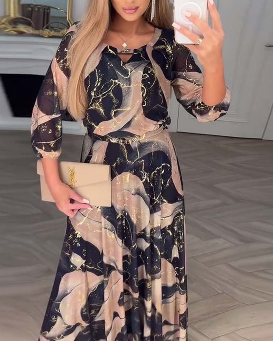 Elegante vestido de gasa con estampado y mangas tres cuartos.-ES