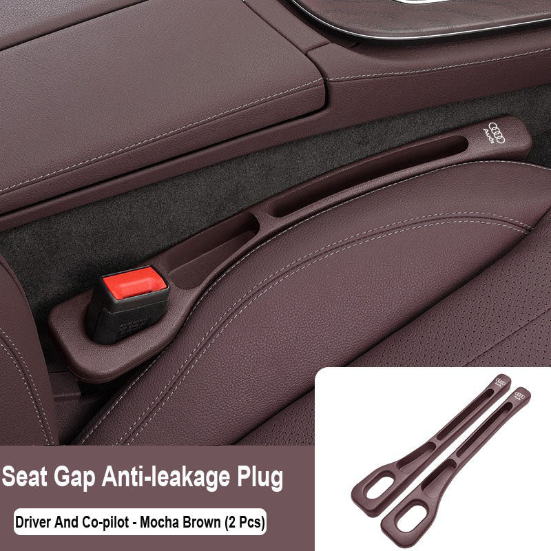 Čep, ki zatesni prostor med avtomobilskimi sedeži-SI
