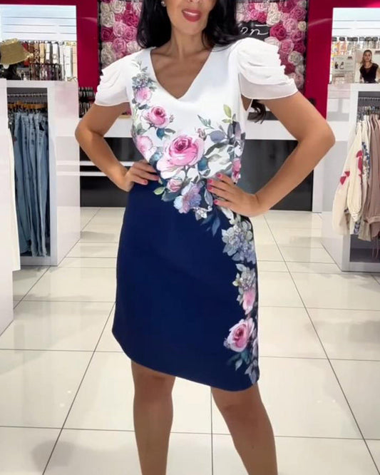 Vestido con mangas abullonadas y escote en pico, con estampado floral en color rosa.-ES