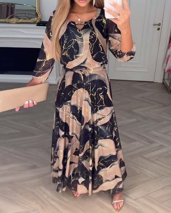 Elegante vestido de gasa con estampado y mangas tres cuartos.-ES