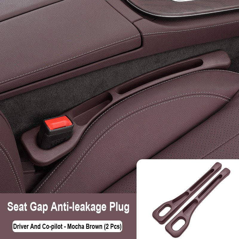 Čep, ki zatesni prostor med avtomobilskimi sedeži-SI