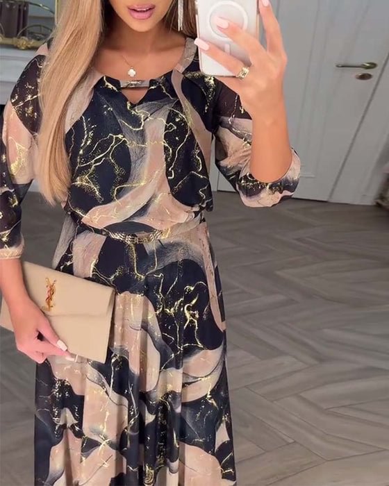 Elegante vestido de gasa con estampado y mangas tres cuartos.-ES