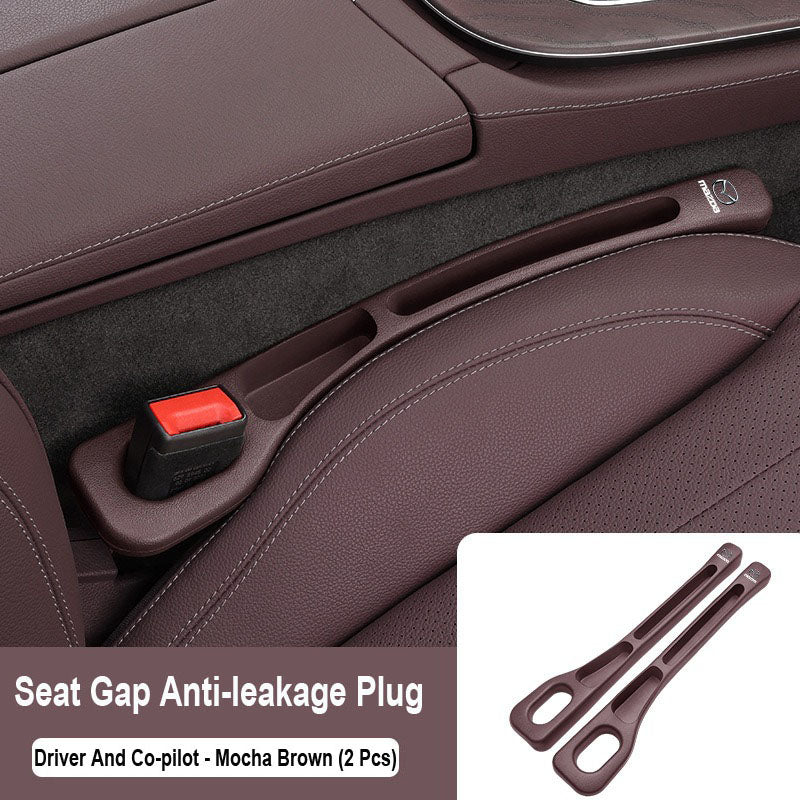 Čep, ki zatesni prostor med avtomobilskimi sedeži-SI