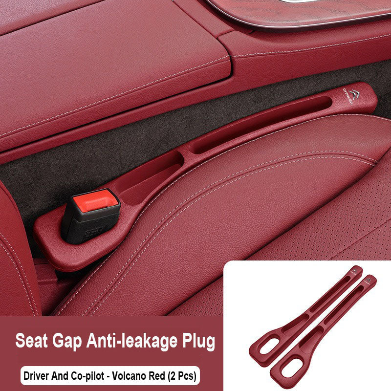Čep, ki zatesni prostor med avtomobilskimi sedeži-SI