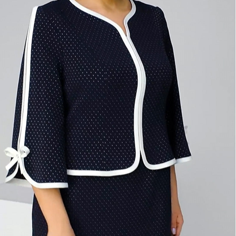 Elegante top con lazo y falda con abertura en la espalda.-ES