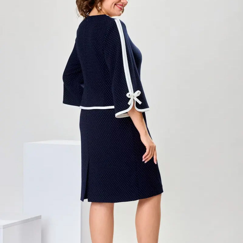 Elegante top con lazo y falda con abertura en la espalda.-ES