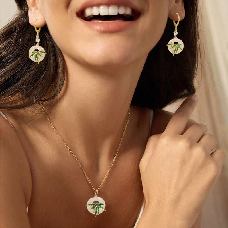 Σκουλαρίκια και κολιέ από μπαμπού σε μοντέρνο ανατολίτικο στιλ-GR